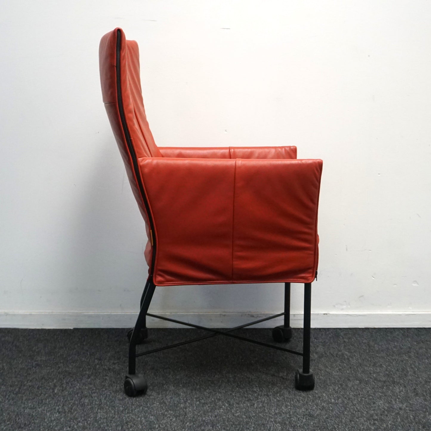 Montis Chaplin Design Stoel | Oranje Leer | Verrijdbaar